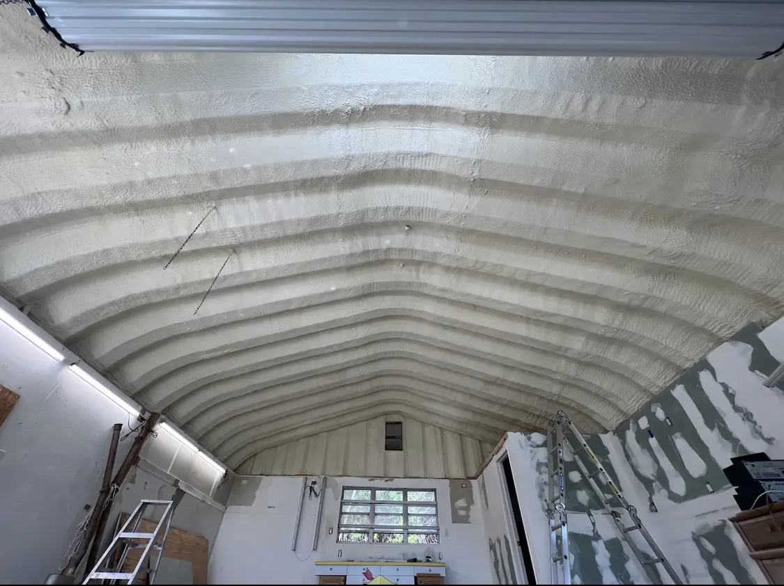 Spray polyurethane foam applied to the underside of a metal roof deck in Muscoy